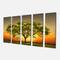 Designart - Green Tree against Setting Sun - Trees Canvas Art Print